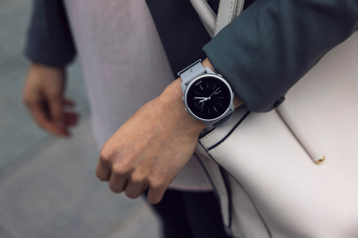 woman wearing Suunto 5 Peak