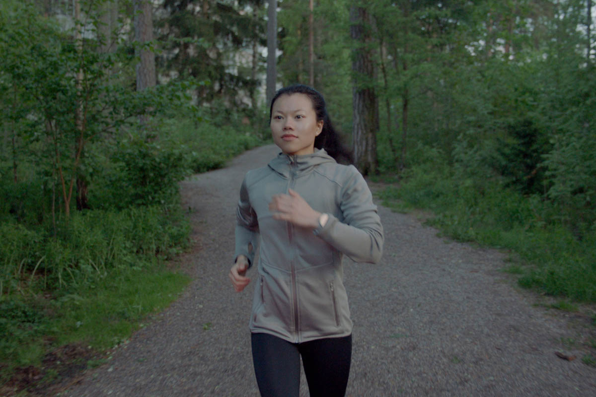 Woman running in the forest